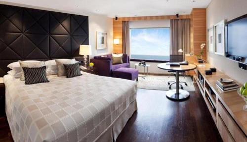 Taj Club Sea View King Bed with 1 way airport transfer , Complimentary high-tea , evening cocktails and 24 hrs tea-coffee at the Taj Club lounge ,Butler Service