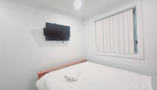 Queen Room with Shared Bathroom