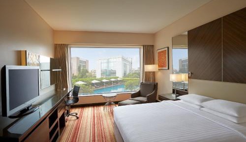 Deluxe King Room with Pool View - 15% off on Spa and 20% off on Laundry