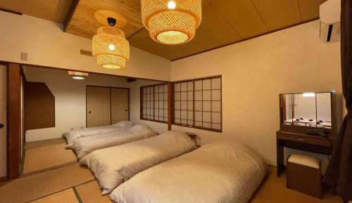 Quadruple Room with Shared Bathroom
