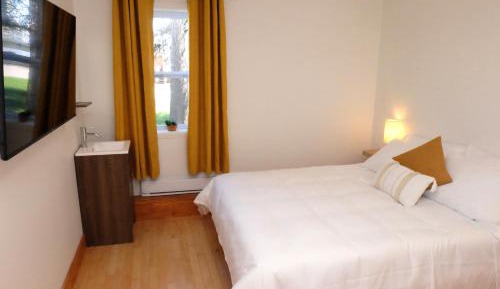 Queen Room with Shared Bathroom