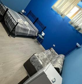 Quadruple Room with Private Bathroom