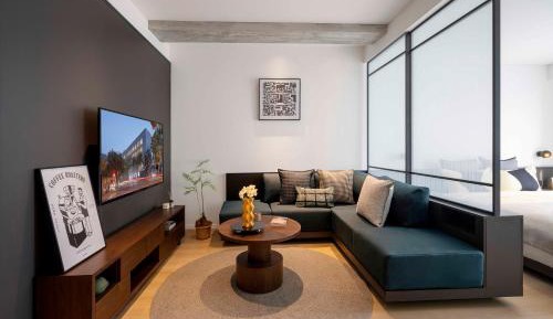 Exquisite One Bedroom Apartment (free coffee, washing machine, kitchen, specious living room, can add an extra bed and additional fee is CNY380 per day)