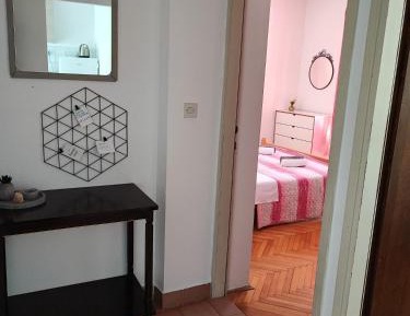 Two-Bedroom Apartment with Balcony and Garden View