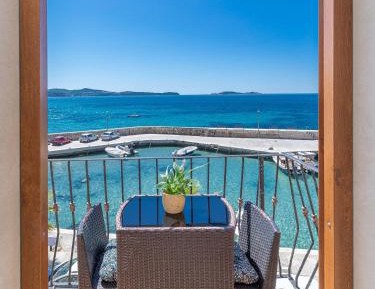 One-Bedroom Apartment with Balcony and Sea View