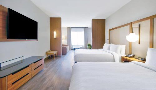 Queen Suite with Two Queen Beds and Sofa Bed