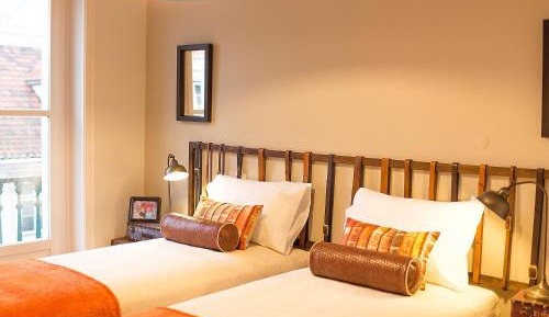 One-Bedroom Apartment with Balcony and River View