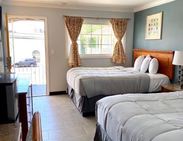 Two Queen Beds with Pool View