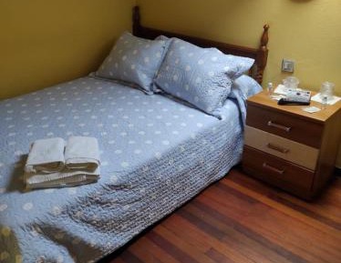 Queen Room with Shared Bathroom