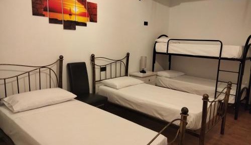 Quadruple Room with Private Bathroom