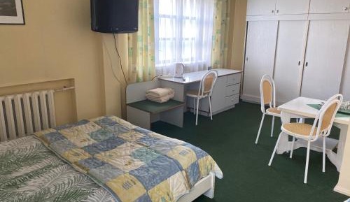 Economy Quadruple Room with Shared Bathroom