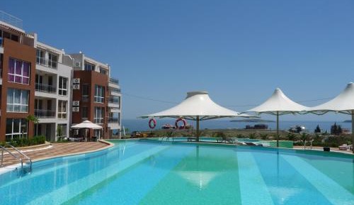 One-Bedroom Apartment with Balcony and Sea View