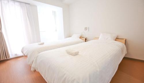 Twin Room with Shared Bathroom
