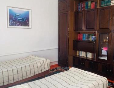 Single Bed in Dormitory Room