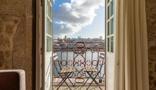 One-Bedroom Apartment with Balcony and River View - Second Floor