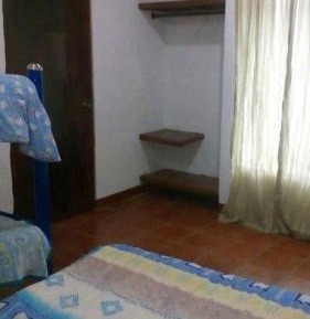 Economy Quadruple Room with Shared Bathroom