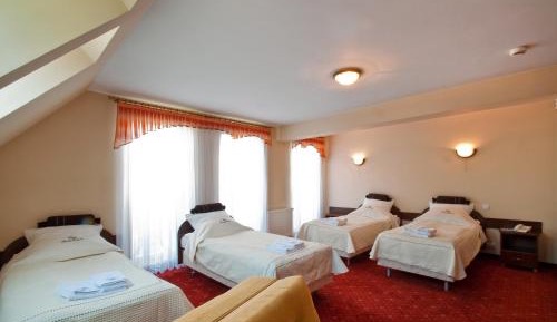 Quadruple Room (2 Adults + 2 Children)