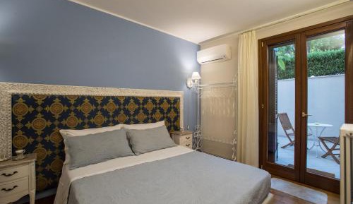 Quadruple Room with Private Bathroom