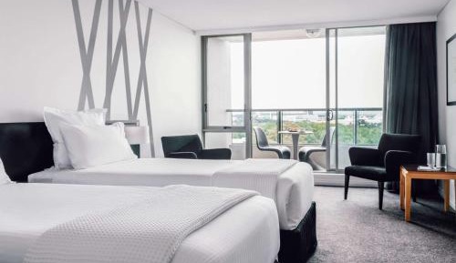 Two-Bedroom Two-Bathroom Deluxe Suite with Balcony and River View - Floors 10-15