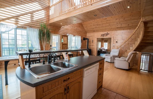 Blue Sea Cottage | Pet Friendly Waterfront Cottage with Hot Tub & Sauna