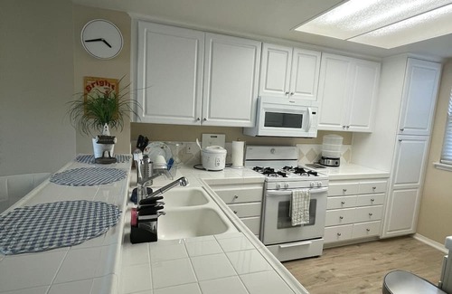 Airport Area Apartment | Relaxing Bedroom with Blackout Curtains for Peaceful Rest