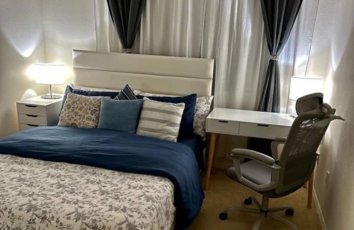 Airport Area Apartment | Relaxing Bedroom with Blackout Curtains for Peaceful Rest