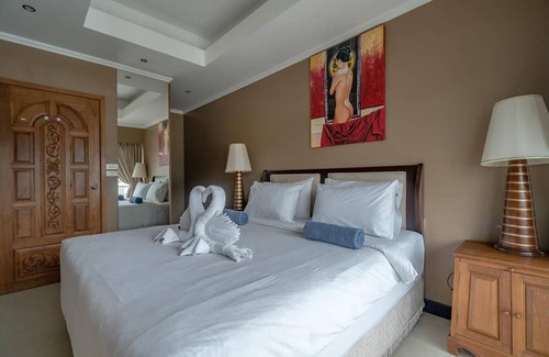 Patong Apartment | Patong Tower Condo: Poolside Retreat, Steps from the Beach