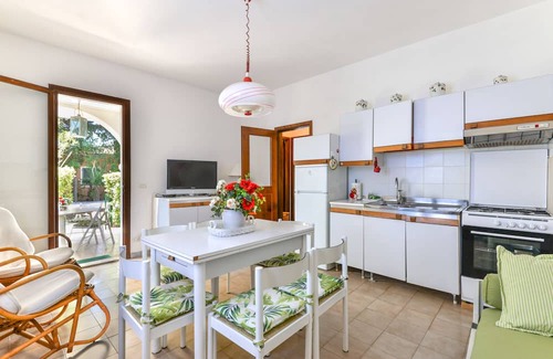 Marmi Apartment | Relax at Villetta Marmi: Oceanfront Apartment with Garden