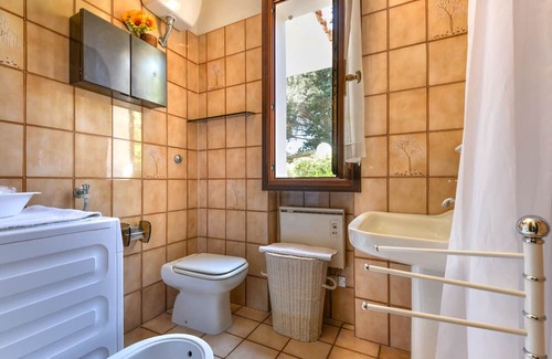 Marmi Apartment | Relax at Villetta Marmi: Oceanfront Apartment with Garden