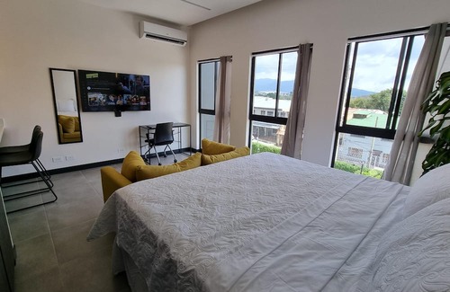 Alajuela Apartment | Conveniently Located Loft with Pool Near Airport