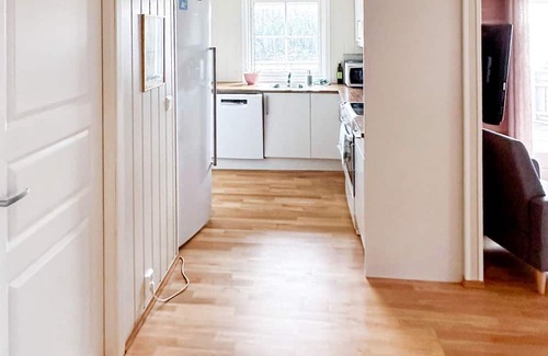 Bomlo House | Cozy Holiday Home for 4 with Oceanfront Views in FINNÅS