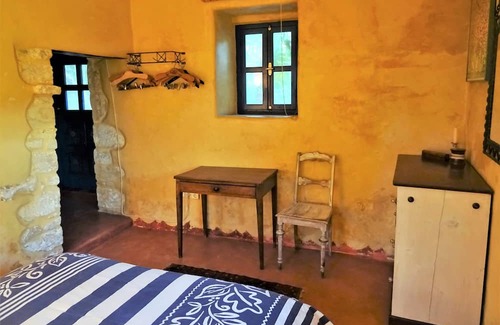 Faistos House | Original, Cretan stone house with a view of the enchanting garden