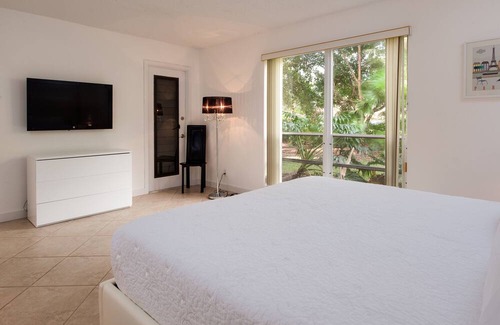 Palm Beach Gardens House | Premier PGA National Condo with Private Entrance & Pool