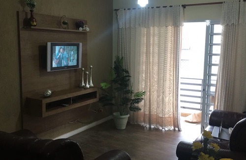 Boqueirao Apartment | Oceanfront Living Room with Balcony and Ocean Views
