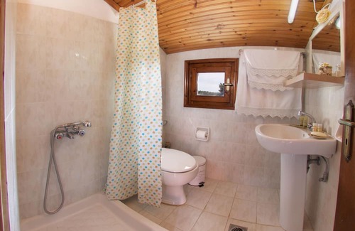 Minia Apartment | Seaview Retreat: Oceanfront Studio with Kitchen & Breakfast