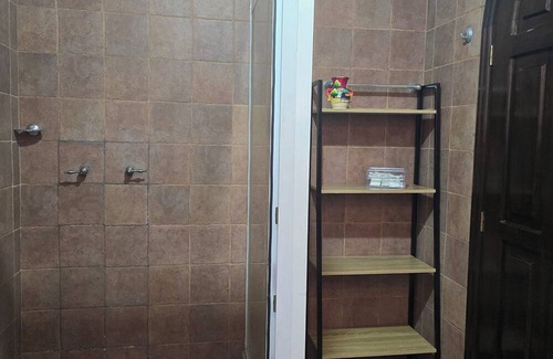 Zona 13 House | Charming bedroom at 3 minutes from the Guatemala city airport.