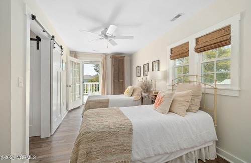 Cedar Point House | Luxury at the Water, enjoy the bikes, kayaks, volleyball, and shared dock that is a short walk away.