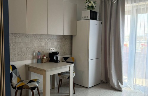 Tractorul Apartment | Ariel ApartmentnnCozy 2-bedroom apartment in charming Brașov with WiFi