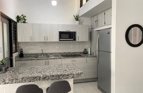 Guacima House | Convenient Stay Near SJO Airport with Free Parking & Amenities