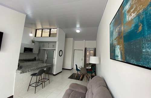 Guacima House | Convenient Stay Near SJO Airport with Free Parking & Amenities