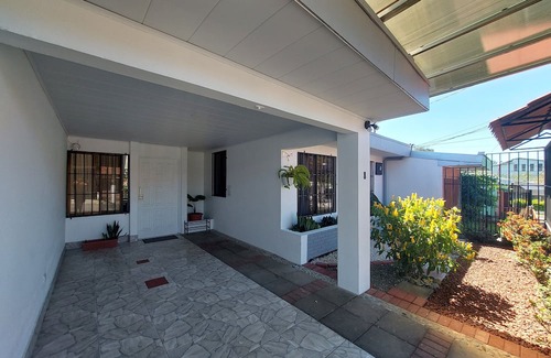 Guacima House | Convenient Stay Near SJO Airport with Free Parking & Amenities