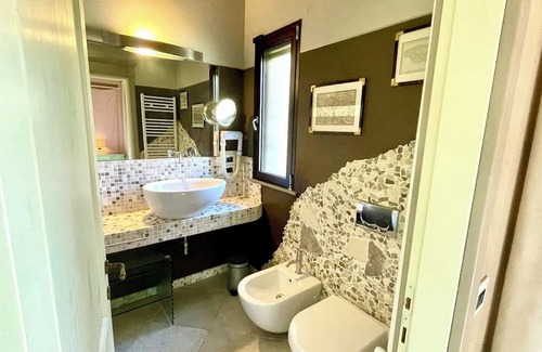 Castiglione della Pescaia Villa | Modern Villa with Pool & Tennis, Minutes from the Beach