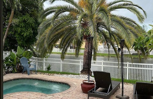 Miramar House | Beautiful lakefront retreat with outdoor kitchen, tiki hut and spa.