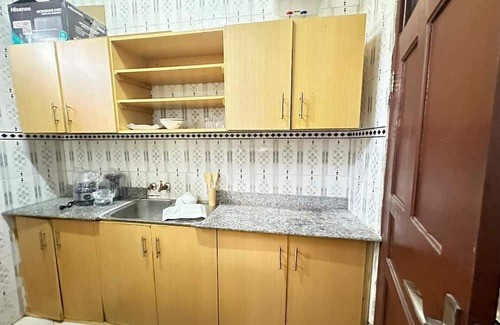 Dar es Salaam House | Unmatched Convenience: The Brownstone Provides Easy Access to Evrything You Need