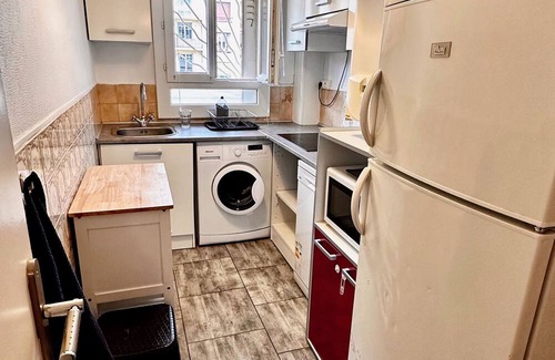 4th Arrondissement Apartment | Charming Cocoon Urban rooftop view