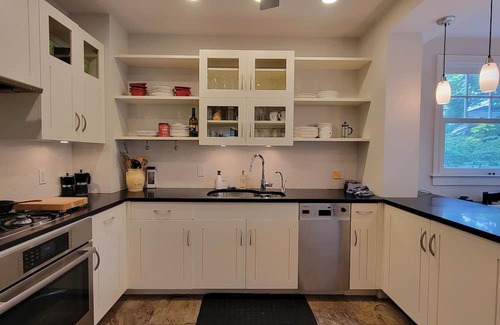 Top of the Hill House | Designer Home in Serene Tree-Lined Neighborhood Awaits