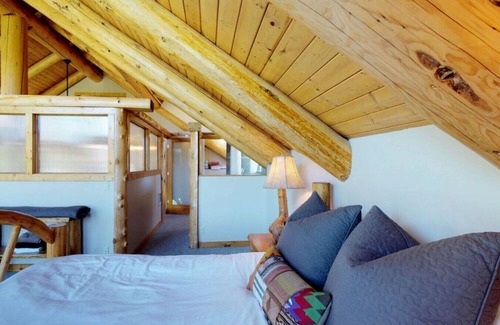 Tamarack Resort Cabin | Inviting Log Cabin Retreat with Hot Tub & Scenic Pond