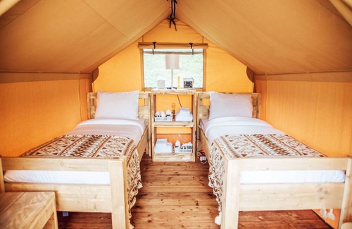 Cassville RV Rental | Tranquil Glamping Retreat Steps from Roaring River Park