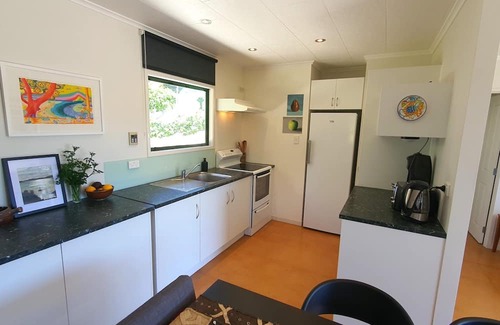 Kawau Island House | Cozy Island Retreat with Ocean View and Poolside Relaxation