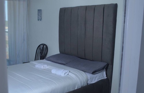 South Beach Apartment | Scenic Ocean View Apartment with Pool & Family Amenities